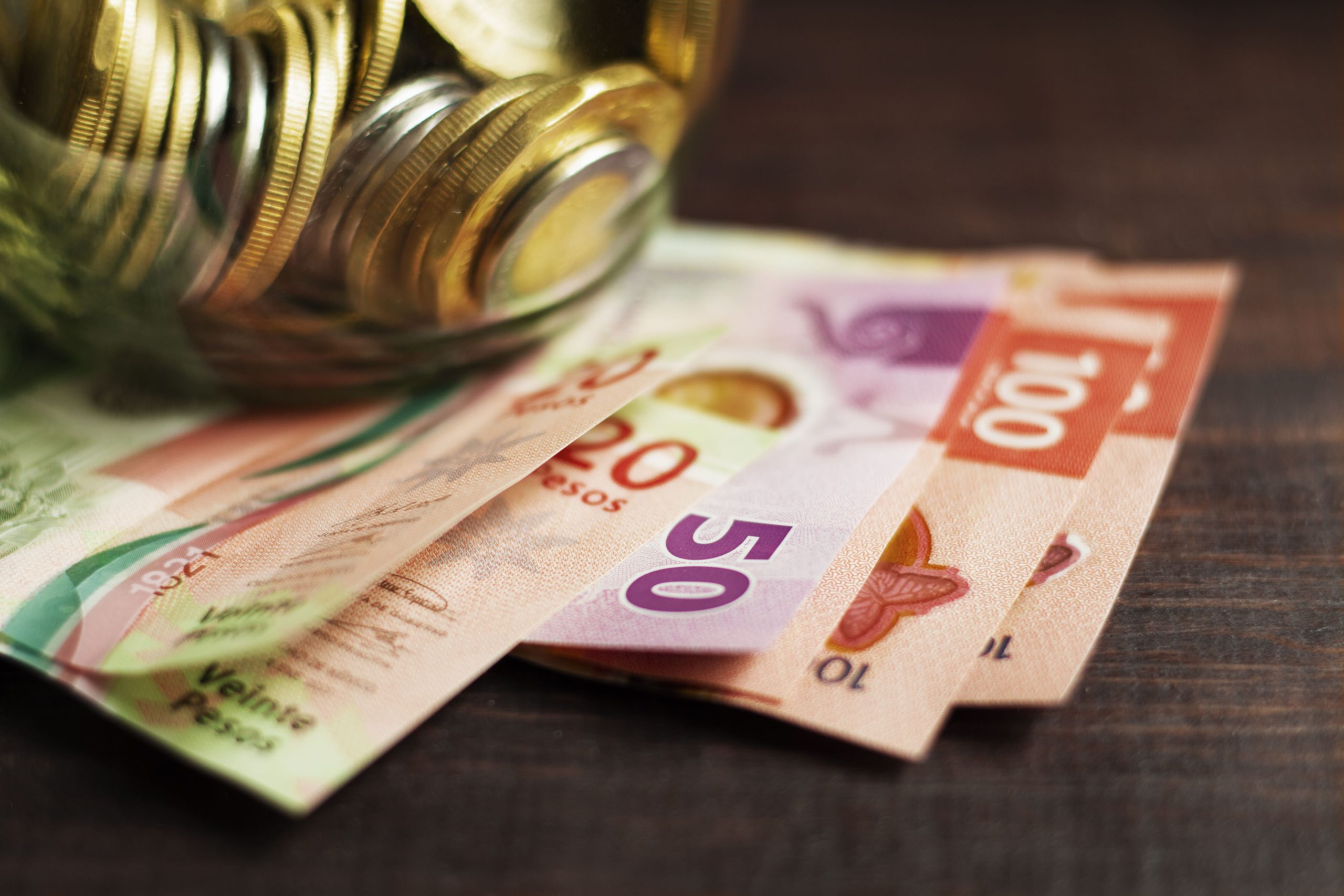 high-angle-mexican-coins-and-banknotes (1)